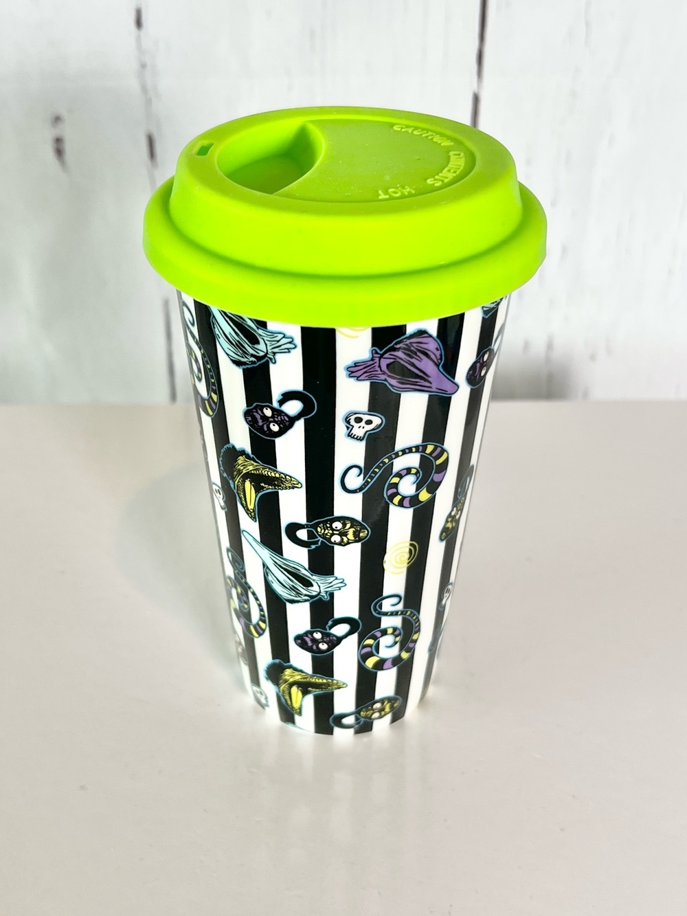 Beetlejuice Ceramic Travel Mug with Silicone Lid | Spirit Halloween Limited